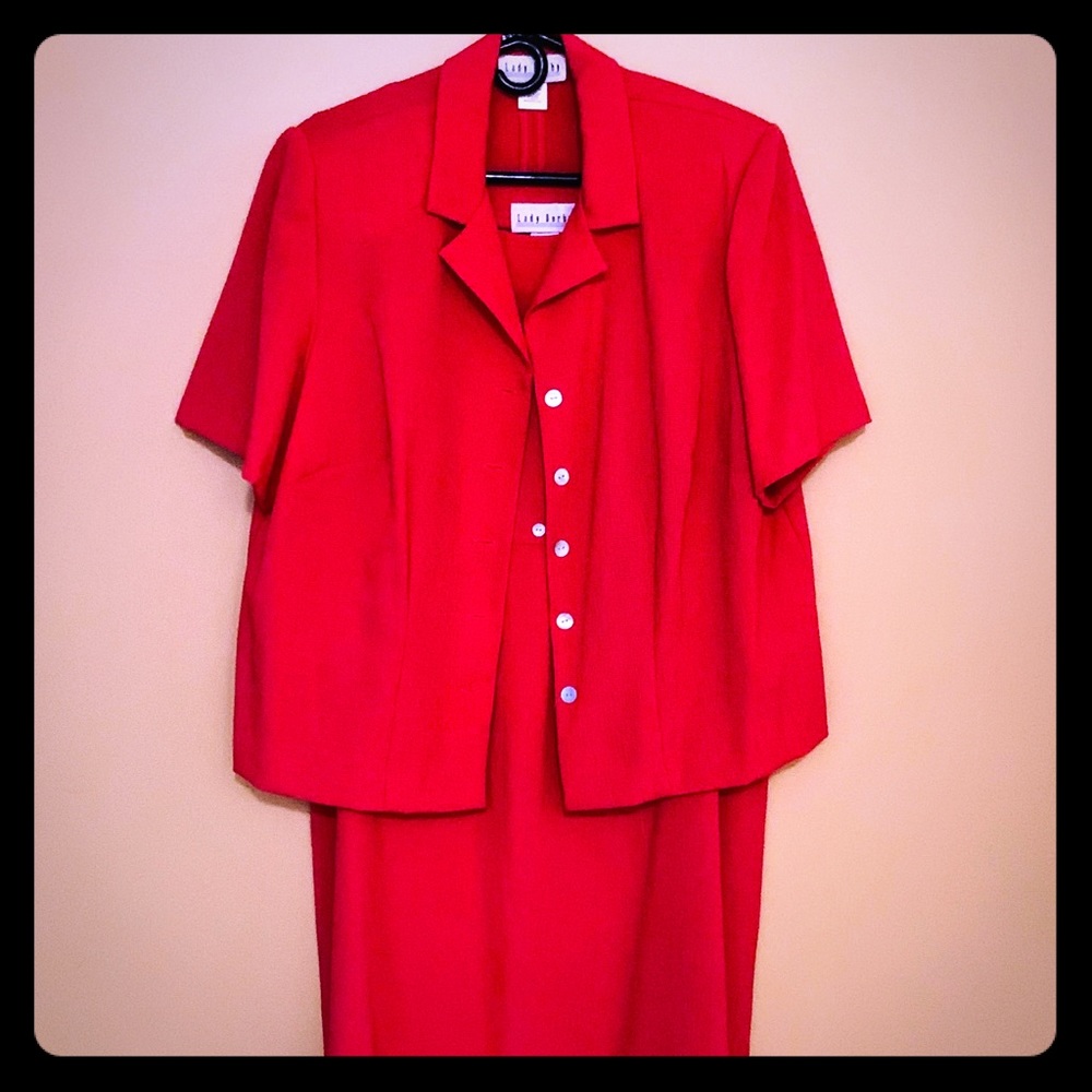 Short sleeve jacket with sleeveless dress.